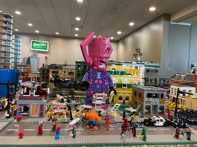 Big superhero fight scene with giant Lego Galactus