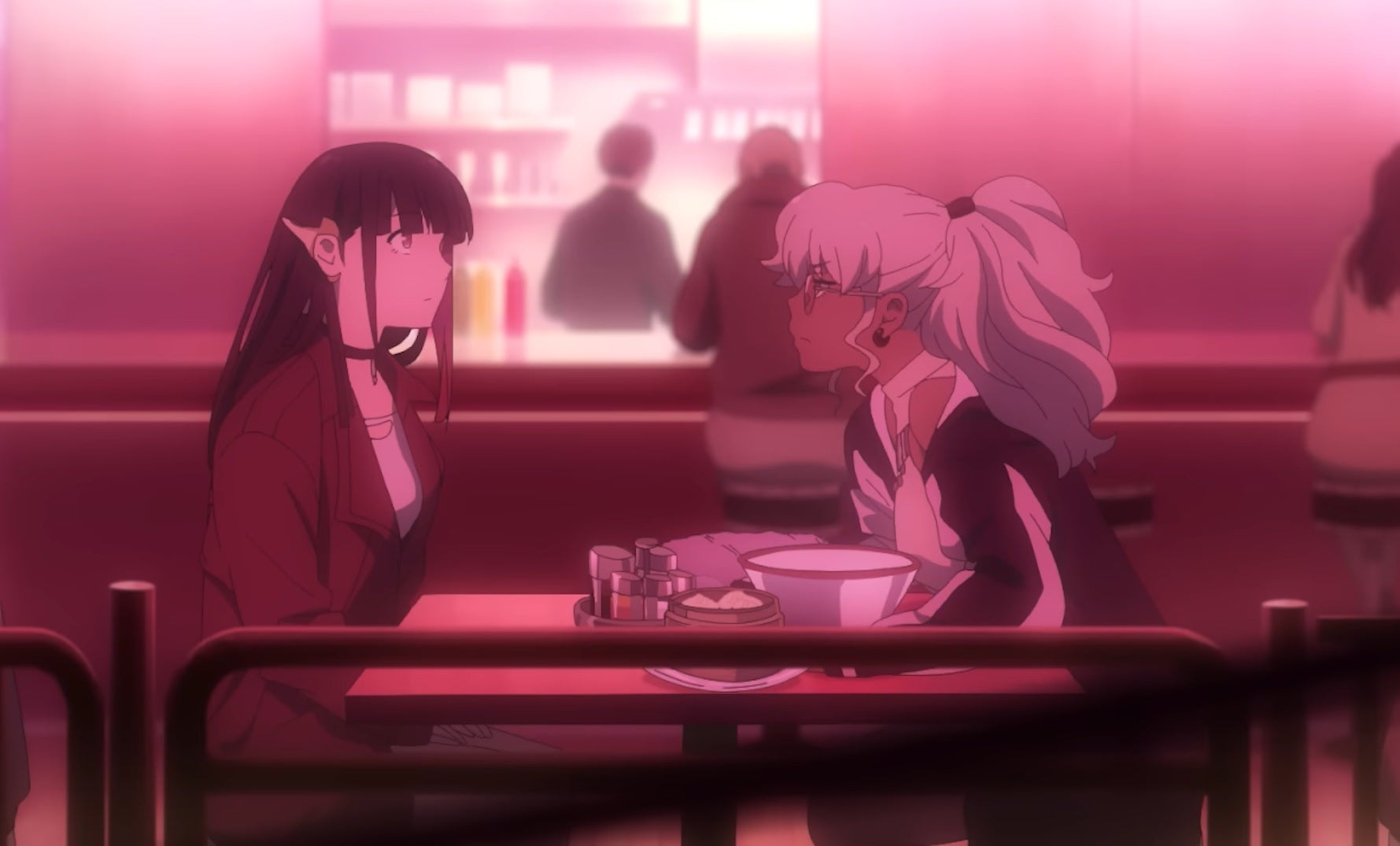 Rouge and Naomi sit at a cafe