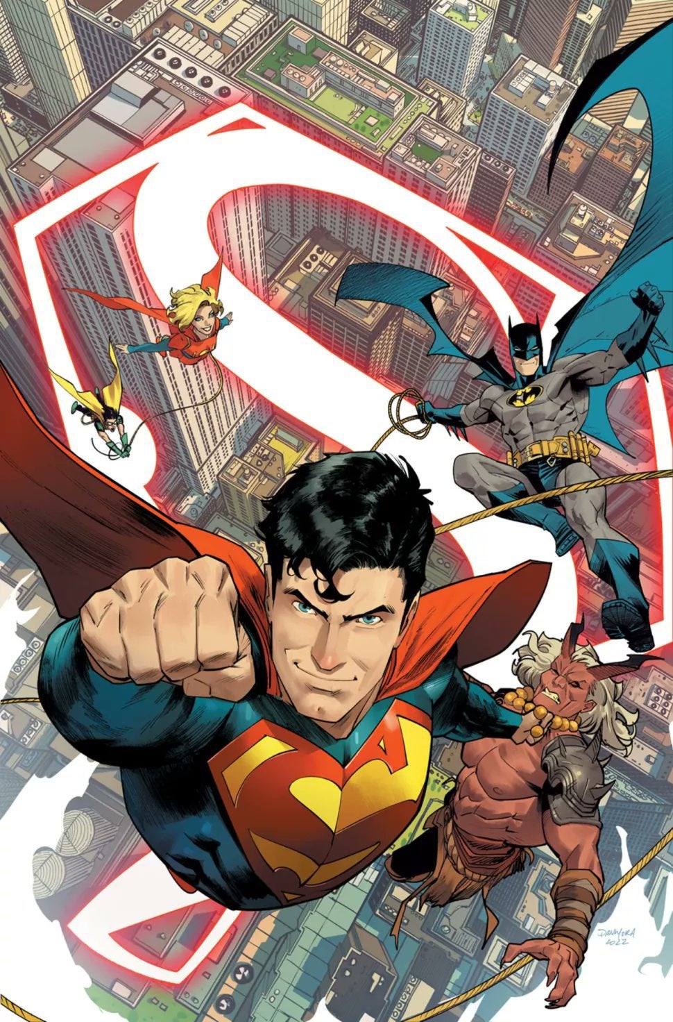 Superman and Batman flying above a city