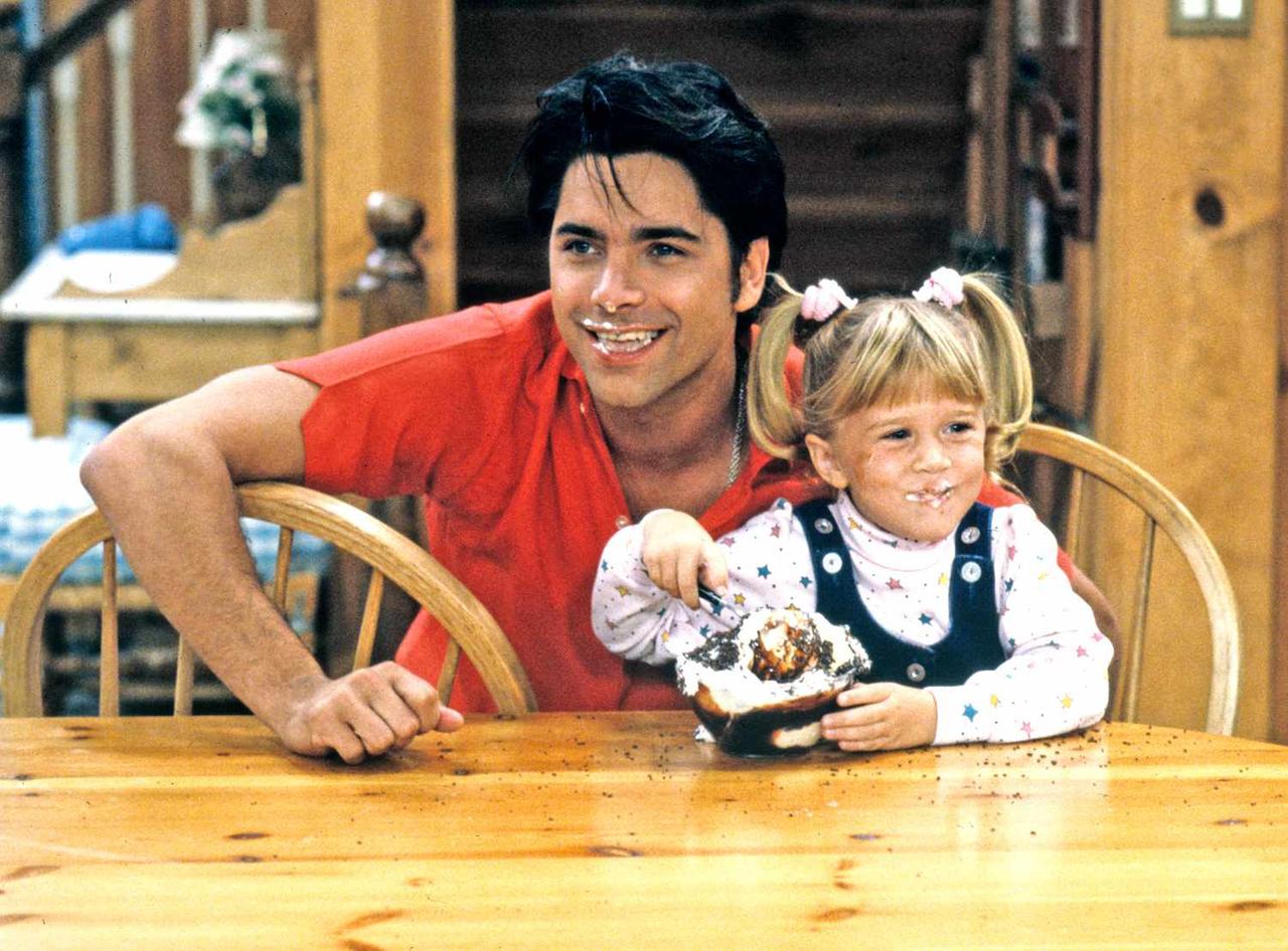 A still of John Stamos and Mary-Kate Olsen in Full House