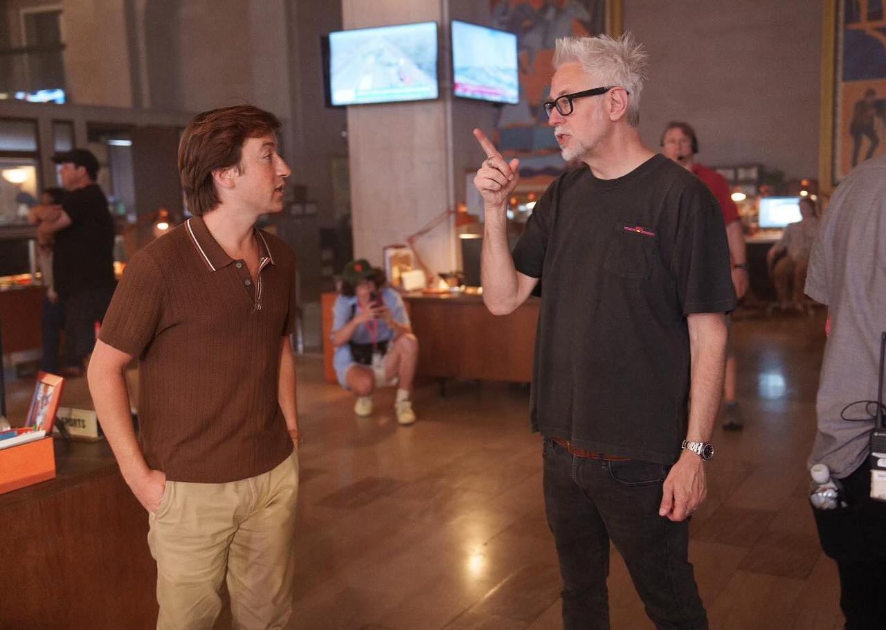 An image of Skyler Gisondo and James Gunn on the set of Superman (2025)